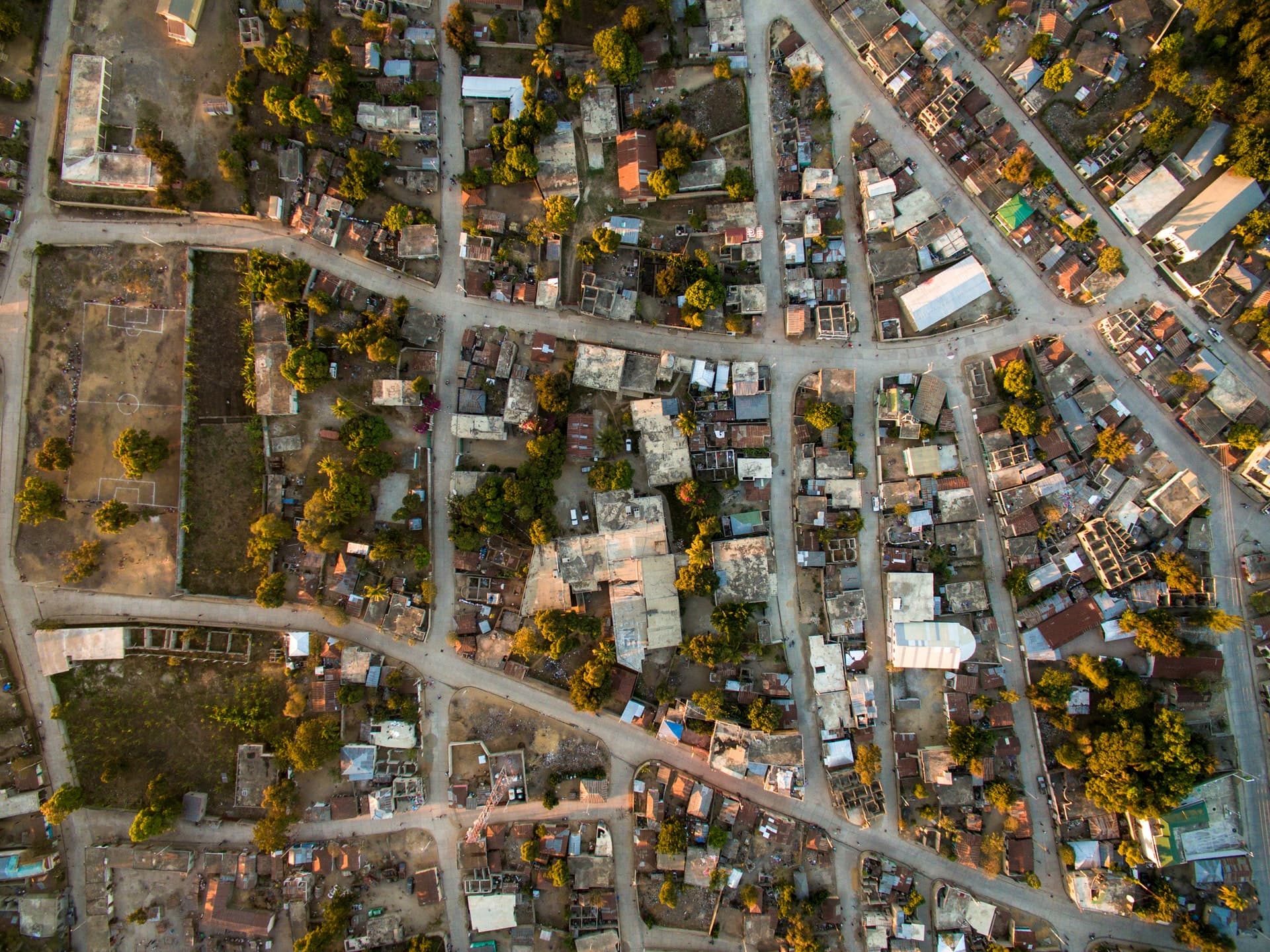 A neighbourhood with houses and streets in Haiti seen from the sky. A neighbourhood with houses and streets in Haiti seen from the sky.